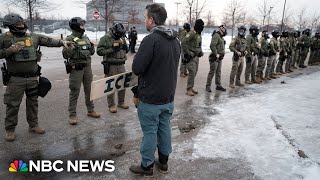 Download lagu Officer who shot woman in Minneapolis was dragged by a vehicle during June immigration arrest mp3