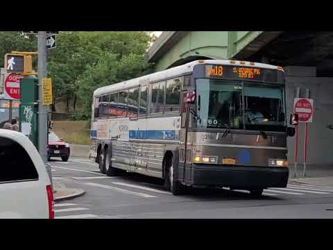 MTA Bus Company: 2007 MCI D4500CL 3318 On The QM18 At Queens Boulevard & Eliot Avenue