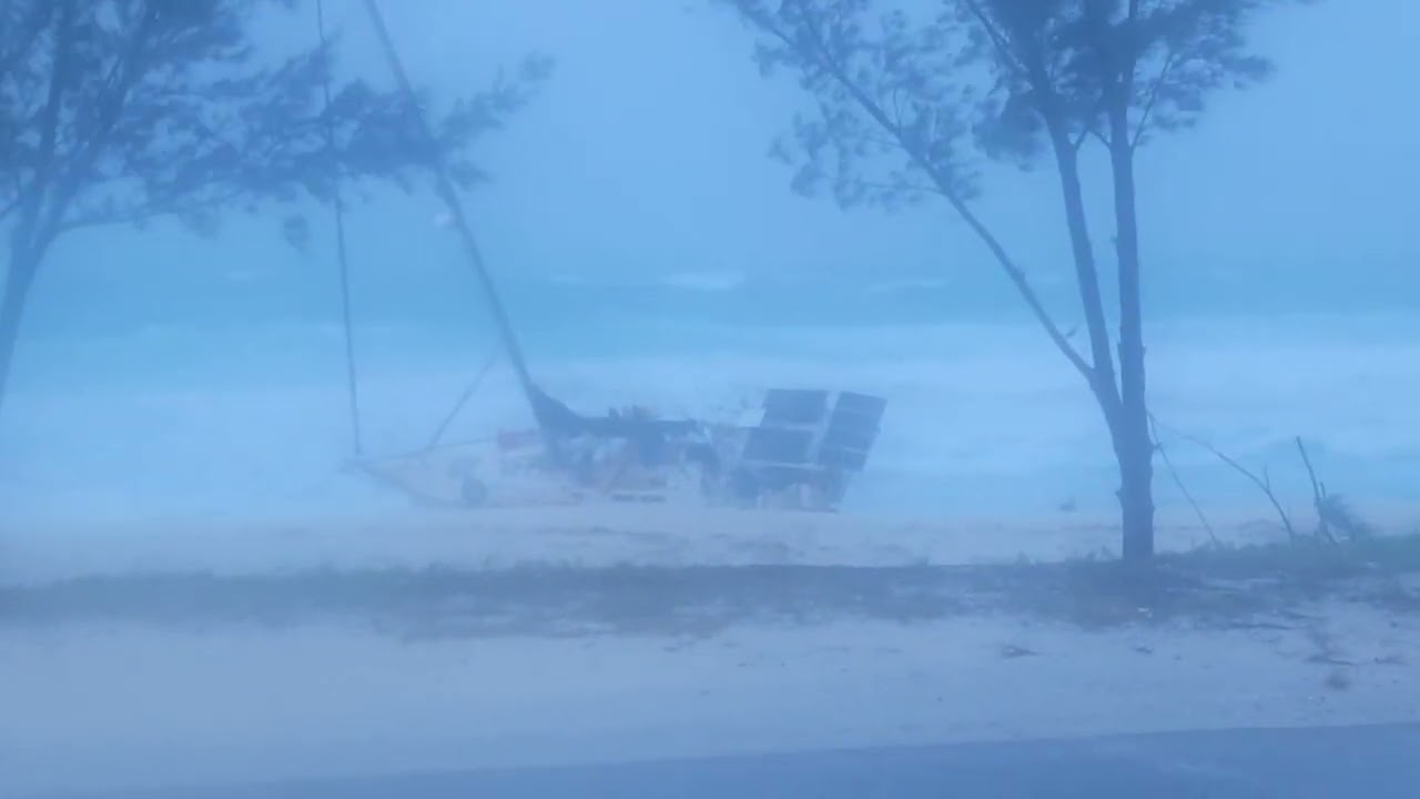 Moments after Epiphany is beached in Bimini Bahamas C&C 39 Sailboat