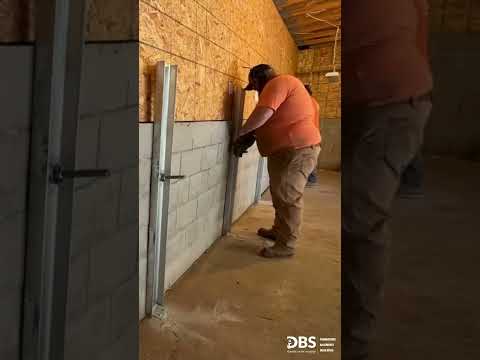Stabilizing a collapsing wall using...
