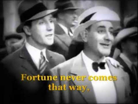 1941: Flanagan & Allen singing "Down Forget-Me-Not Lane"