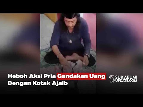 Heboh Aksi Pria Gandakan Uang Dengan Kotak Ajaib