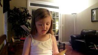 Lacey singing, "Grandma Got Run Over By A Reindeer"