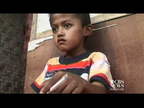 Indonesian boy smokes two packs a day