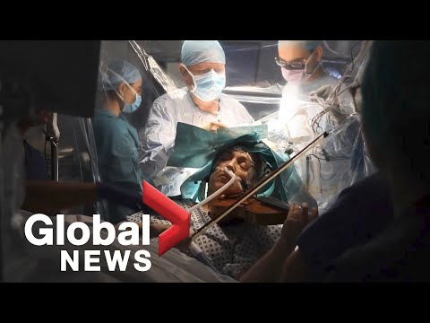 Patient plays violin while getting tumour removed from brain to save musical skills