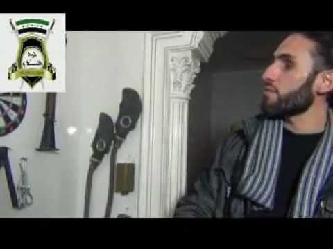 شرح قائد لواء السلام وقائد جبهة الإذاعة أبو علي صليبة التابع للواء السلام في غرفة تجهيز الصواريخ و القنابل