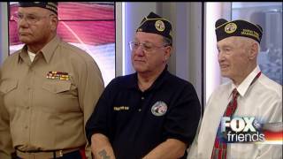 Lee Greenwood performs "God Bless the USA" on Veterans Day.