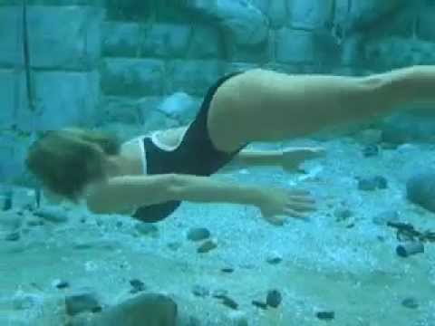 Professional Woman Free Diver in Aquarium