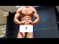 Bodybuilder flexing ALL muscles