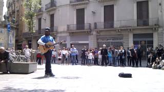 Clarence Milton Bekker playing &#39;Three Little Birds&#39; by Bob Marley and the Wailers in Barcelona