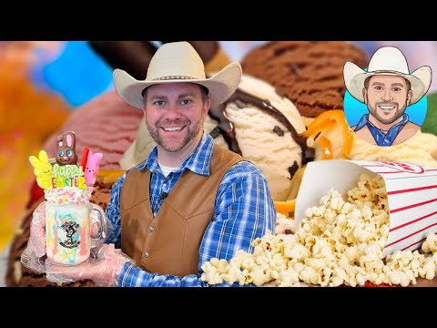 Smiling man in a cowboy hat holds a colorful Easter milkshake with bunny toppers, while popcorn and ice cream surround him.
