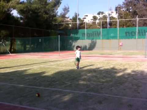 Rafael Pagonis playing tennis at age 3,5