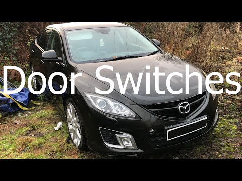 How to remove drivers door controls window switches Mazda 6