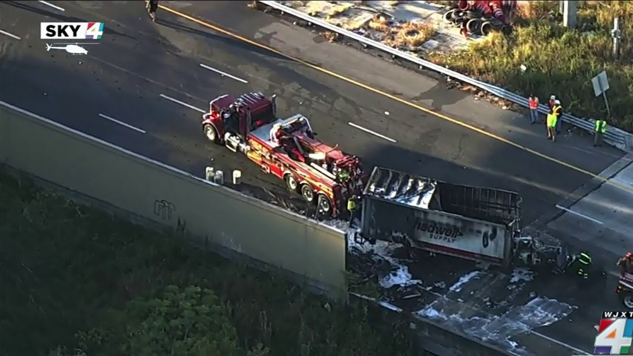 FHP: Truck driver falls asleep, hits parked semi, sparking fiery crash that closes Buckman Bridg...