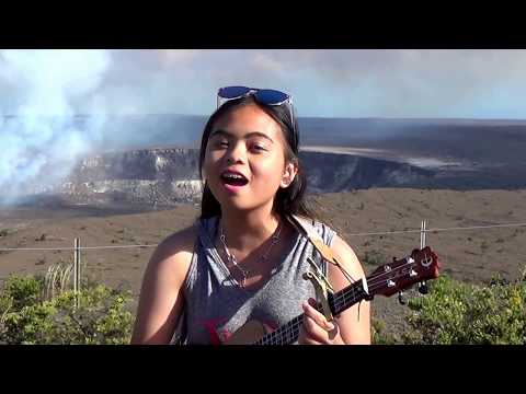 Girl singing on top of Volcano - Hawaii