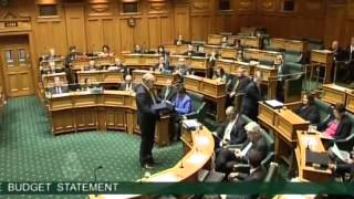 The Minister of Finance distributing copies of the Budget statement