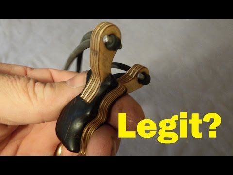 Tiny 2" slingshot breaks bottles, shoots full size arrows