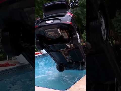 Car crashes into a swimming pool after the brakes fail