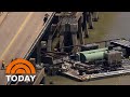 Barge slams into Texas bridge, triggers partial collapse and oil spill