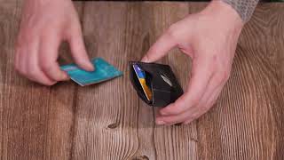 Цікавий картхолдер з утримувачем для Apple AirTag з натуральної шкіри Grande Pelle 11608 чорний