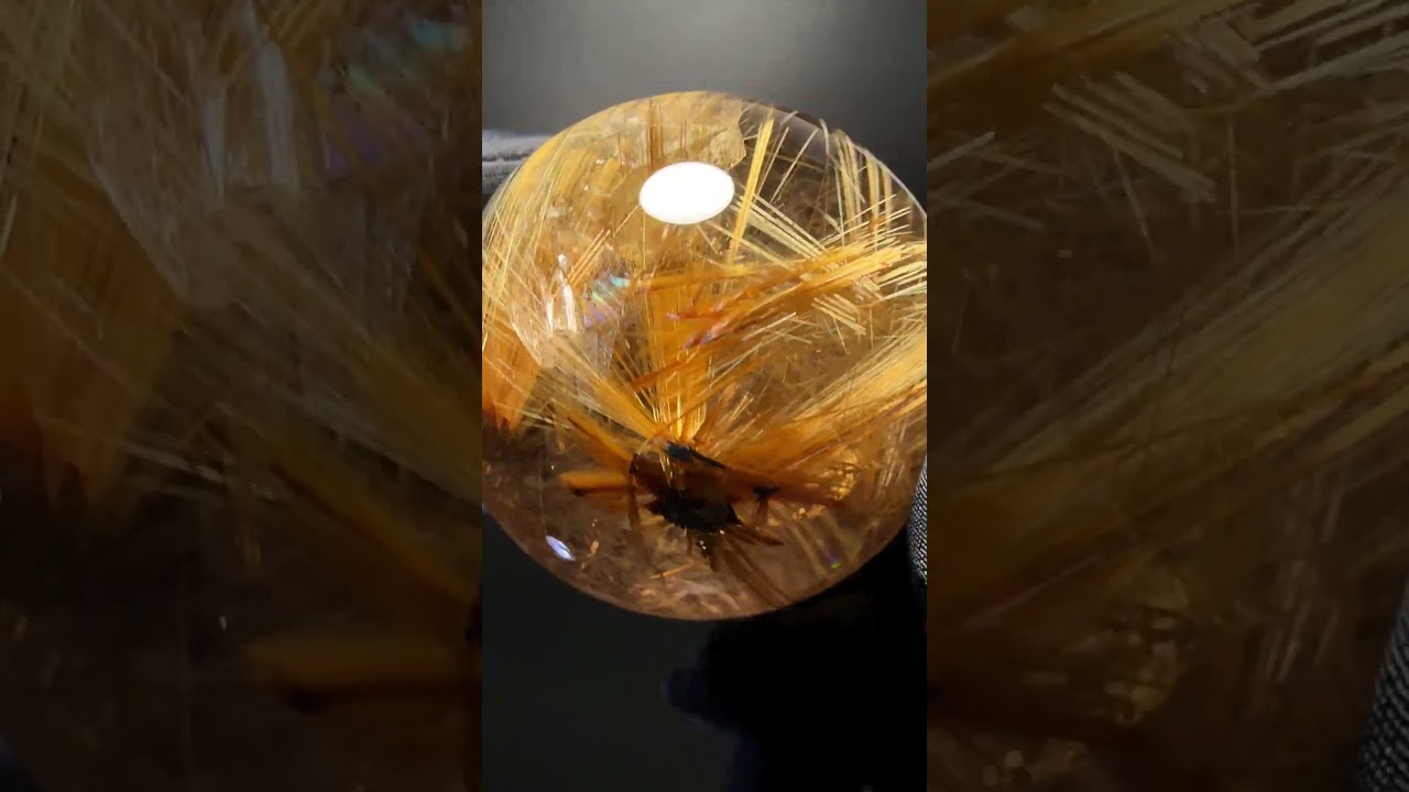 [高品質]ブラジル産タイチンルチルクォーツ丸玉/スフィア（球体球体直径49.1mm・ヘマタイト共生、内部レインボー！）★現品動画あり-slide-youtube