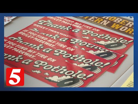 Report a pothole and get a bumper sticker - YouTube