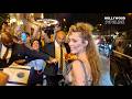 Miley Cyrus Draws A Crowd In Risqué Gown In Paris