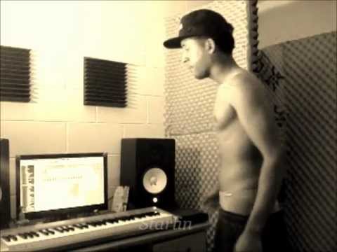 Starlin singing Your love is my high in the studio