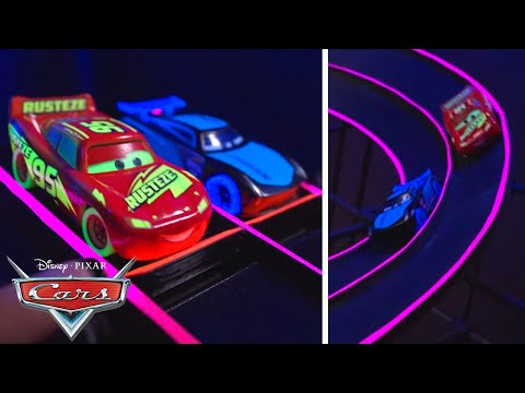 Lightning McQueen and Jackson Storm Challenge the Glowing Racetrack | Pixar Cars | @disneyjr