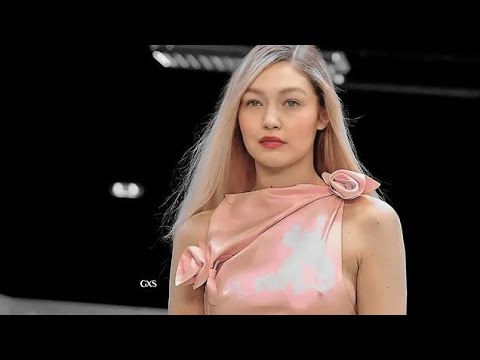 Gigi Hadid wearing gorgeous pink dress Coperni Fall winter 2022 fashion show at Paris Fashion Week