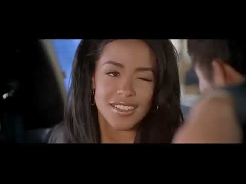 Romeo Must Die trailer frame: Aaliyah and Jet Li framed against neon as a beat drops