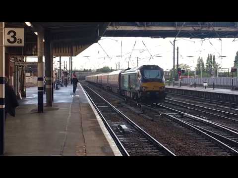 (HD) DRS class 68s TNT 68002 +68017 storm out off Doncaster working.Northern bell  form carlise
