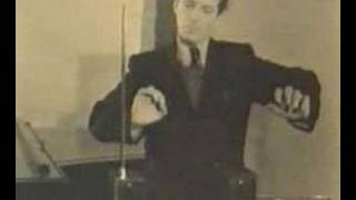 Leon Theremin playing his own instrument