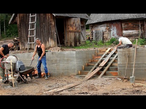 Hard work in the pouring rain. The steps are ready. Amazing transformation of the yard
