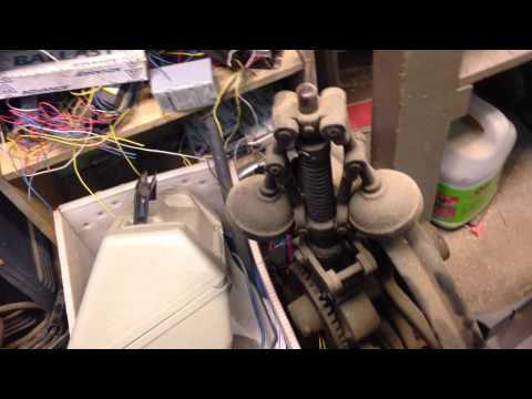 VERY old and beautiful Otis manually controlled elevator. (No door or gate.)