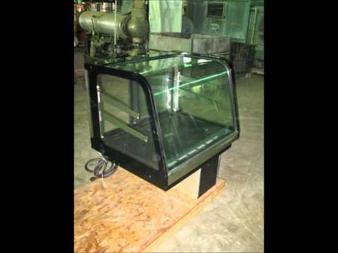 Genemco's Used Federal Industries Curved Glass Refrigerated Countertop Signature Series Display Case