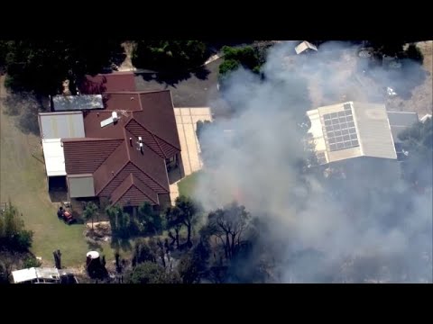 WATCH: Bushfires burn through homes in northern Perth