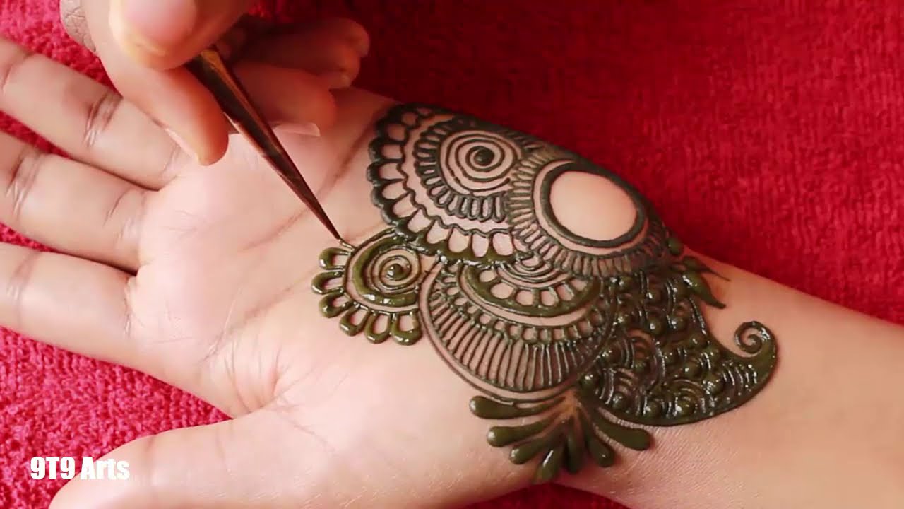 Beautiful semi bridal arabic mehndi design for front hand by 9t9 art ...