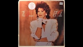 Hold Me by K.T. Oslin from her album This Woman
