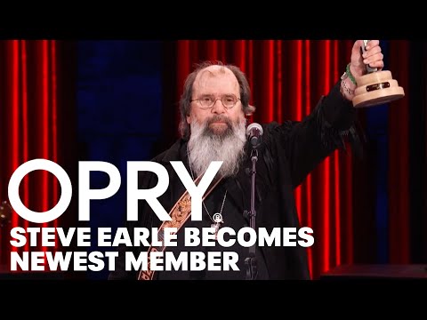 Emmylou Harris Inducts Steve Earle as the Newest Member of the Grand Ole Opry