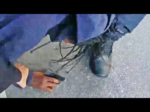 Bodycam Shows Gun Firing as NYPD Police Officers Wrestle Gun Away From Suspect