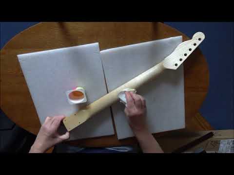 Neck preparation on a Coban Guitars Telecaster kit guitar, waterslide decals, and boiled linseed oil