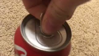 How to quietly open a soda can