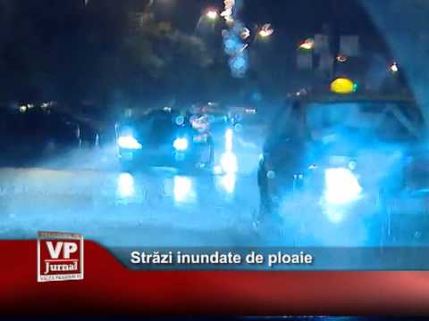 Străzi inundate de ploaie