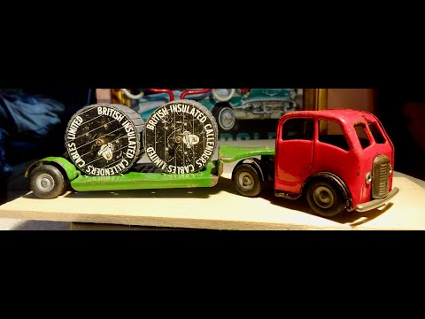 Minic clockwork vehicles + tinplate carousels.  #48.