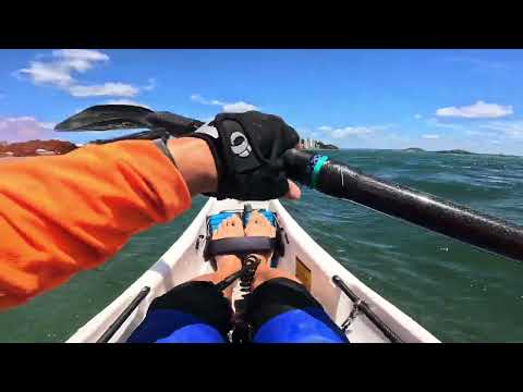 Kohimarama beach at low tide. Many rocks. NK Breeze PE Surfski