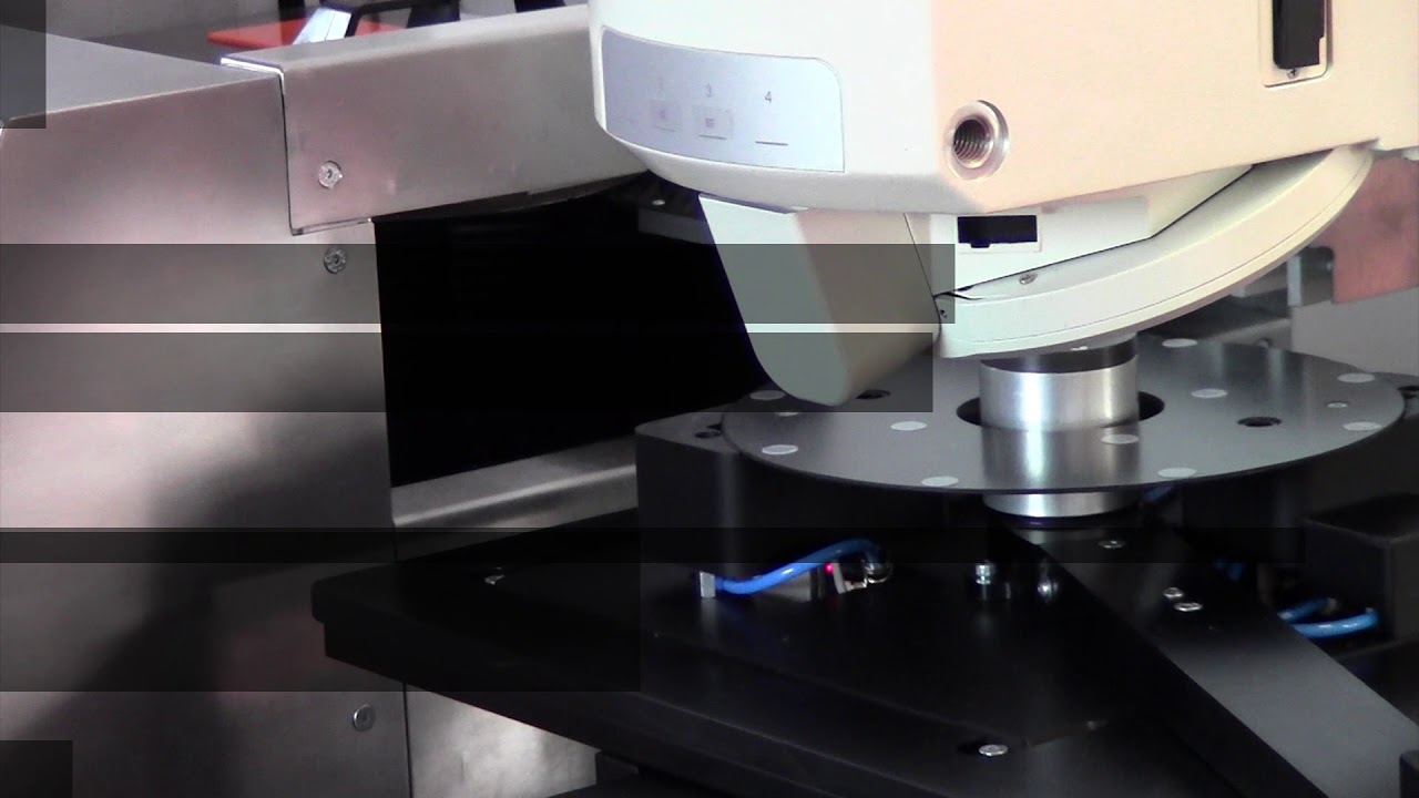 Automatic loader for highly warped wafers