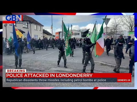 Londonderry attack: Police hit with petrol bombs at an illegal dissident republican march