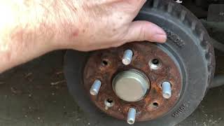 2000 Kia Sephia spectra rear drum brake replacement. A puzzle for owners in the road