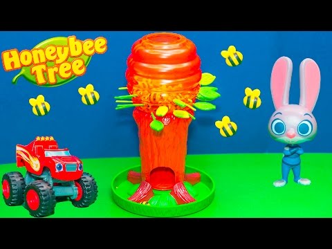 P;laying the Honey Bee Tree Game with Blaze against Zootopia Toys